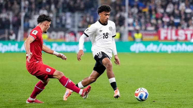 v li Eldin Dzogovic Luxembourg, 20 , Nathaniel Brown Germany, 18 , duel, duel, tackle, tackling, dynamics, action, action, 10 10 2025, Sinsheim Germany , football, World Cup qualification, Germany Luxembourg, THE EVENT REGULATIONS PROHIBIT ANY USE OF PHOTOGRAPHS AS IMAGE SEQUENCES AND OR QUASI VIDEOS xozx