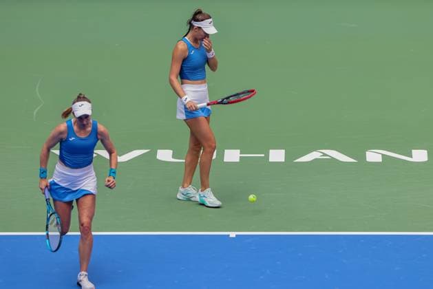 WUHAN, CHINA - OCTOBER 11: Olivia Nicholls of Great Britain and Tereza Mihalikova of Slovakia react in the Women s Doubles Semifinal match against Storm Hunter of Australia and Katerina Siniakova of the Czech Republic on day 8 of 2025 Wuhan Open at Optics Valley International Tennis Center on October 11, 2025 in Wuhan, Hubei Province of China.  Copyright: xVCGx 111596553997