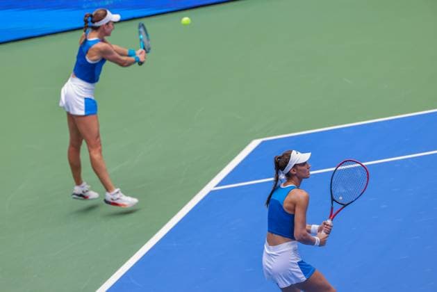 WUHAN, CHINA - OCTOBER 11: Olivia Nicholls of Great Britain and Tereza Mihalikova of Slovakia return a shot in the Women s Doubles Semifinal match against Storm Hunter of Australia and Katerina Siniakova of the Czech Republic on day 8 of 2025 Wuhan Open at Optics Valley International Tennis Center on October 11, 2025 in Wuhan, Hubei Province of China.  Copyright: xVCGx 111596554015