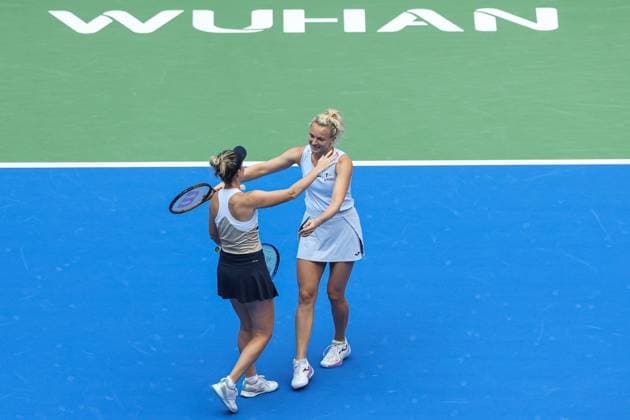 WUHAN, CHINA - OCTOBER 11: Storm Hunter of Australia and Katerina Siniakova of the Czech Republic react in the Women s Doubles Semifinal match against Olivia Nicholls of Great Britain and Tereza Mihalikova of Slovakia on day 8 of 2025 Wuhan Open at Optics Valley International Tennis Center on October 11, 2025 in Wuhan, Hubei Province of China.  Copyright: xVCGx 111596553926
