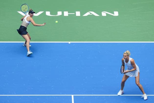 WUHAN, CHINA - OCTOBER 11: Storm Hunter of Australia and Katerina Siniakova of the Czech Republic return a shot in the Women s Doubles Semifinal match against Olivia Nicholls of Great Britain and Tereza Mihalikova of Slovakia on day 8 of 2025 Wuhan Open at Optics Valley International Tennis Center on October 11, 2025 in Wuhan, Hubei Province of China.  Copyright: xVCGx 111596553912