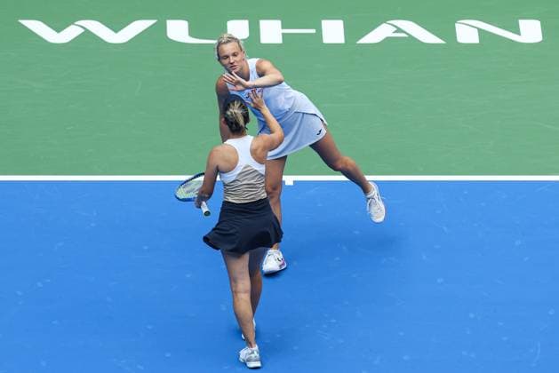 WUHAN, CHINA - OCTOBER 11: Storm Hunter of Australia and Katerina Siniakova of the Czech Republic react in the Women s Doubles Semifinal match against Olivia Nicholls of Great Britain and Tereza Mihalikova of Slovakia on day 8 of 2025 Wuhan Open at Optics Valley International Tennis Center on October 11, 2025 in Wuhan, Hubei Province of China.  Copyright: xVCGx 111596553916