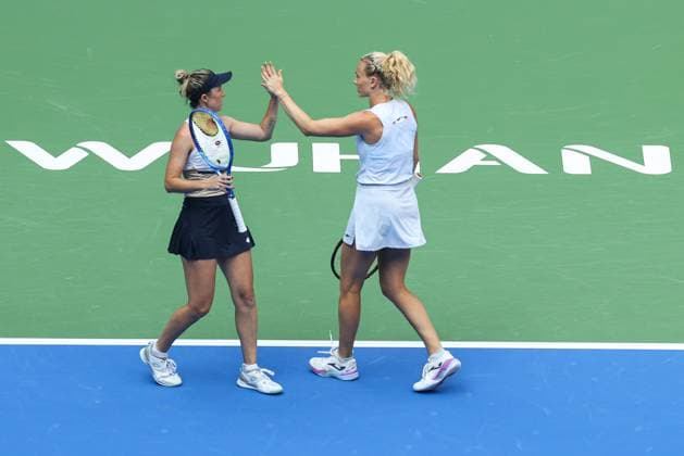 WUHAN, CHINA - OCTOBER 11: Storm Hunter of Australia and Katerina Siniakova of the Czech Republic react in the Women s Doubles Semifinal match against Olivia Nicholls of Great Britain and Tereza Mihalikova of Slovakia on day 8 of 2025 Wuhan Open at Optics Valley International Tennis Center on October 11, 2025 in Wuhan, Hubei Province of China.  Copyright: xVCGx 111596553918