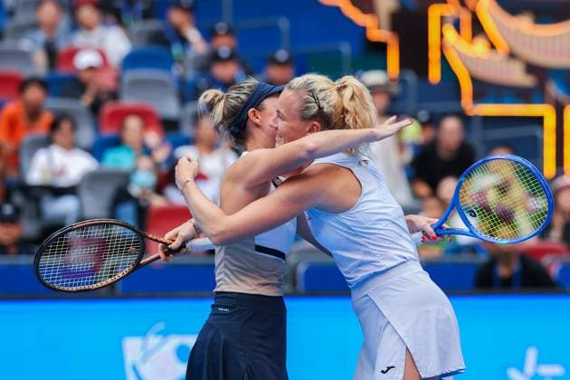WUHAN, CHINA - OCTOBER 11: Storm Hunter of Australia and Katerina Siniakova of the Czech Republic react in the Women s Doubles Semifinal match against Olivia Nicholls of Great Britain and Tereza Mihalikova of Slovakia on day 8 of 2025 Wuhan Open at Optics Valley International Tennis Center on October 11, 2025 in Wuhan, Hubei Province of China.  Copyright: xVCGx 111596553890
