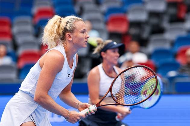 WUHAN, CHINA - OCTOBER 11: Storm Hunter of Australia and Katerina Siniakova of the Czech Republic return a shot in the Women s Doubles Semifinal match against Olivia Nicholls of Great Britain and Tereza Mihalikova of Slovakia on day 8 of 2025 Wuhan Open at Optics Valley International Tennis Center on October 11, 2025 in Wuhan, Hubei Province of China.  Copyright: xVCGx 111596553873