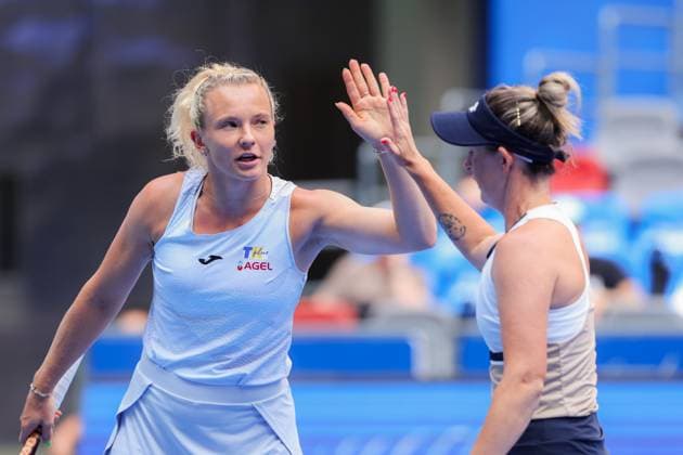 WUHAN, CHINA - OCTOBER 11: Storm Hunter of Australia and Katerina Siniakova of the Czech Republic react in the Women s Doubles Semifinal match against Olivia Nicholls of Great Britain and Tereza Mihalikova of Slovakia on day 8 of 2025 Wuhan Open at Optics Valley International Tennis Center on October 11, 2025 in Wuhan, Hubei Province of China.  Copyright: xVCGx 111596553827