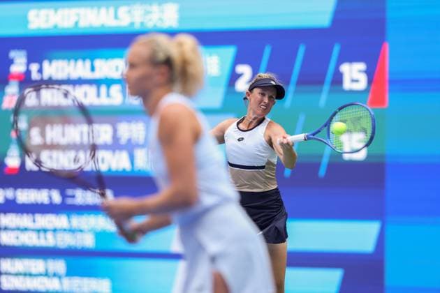 WUHAN, CHINA - OCTOBER 11: Storm Hunter of Australia and Katerina Siniakova of the Czech Republic return a shot in the Women s Doubles Semifinal match against Olivia Nicholls of Great Britain and Tereza Mihalikova of Slovakia on day 8 of 2025 Wuhan Open at Optics Valley International Tennis Center on October 11, 2025 in Wuhan, Hubei Province of China.  Copyright: xVCGx 111596553831