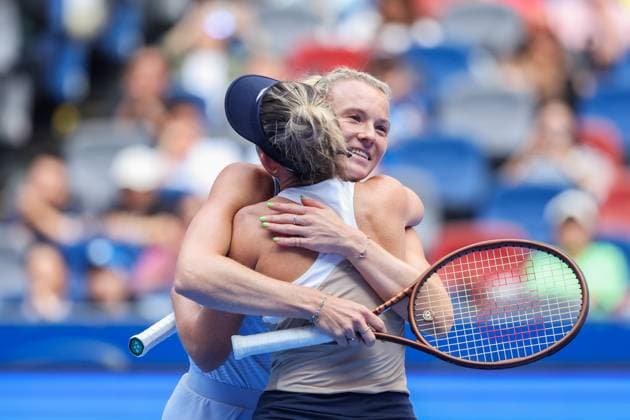 WUHAN, CHINA - OCTOBER 11: Storm Hunter of Australia and Katerina Siniakova of the Czech Republic react in the Women s Doubles Semifinal match against Olivia Nicholls of Great Britain and Tereza Mihalikova of Slovakia on day 8 of 2025 Wuhan Open at Optics Valley International Tennis Center on October 11, 2025 in Wuhan, Hubei Province of China.  Copyright: xVCGx 111596553853