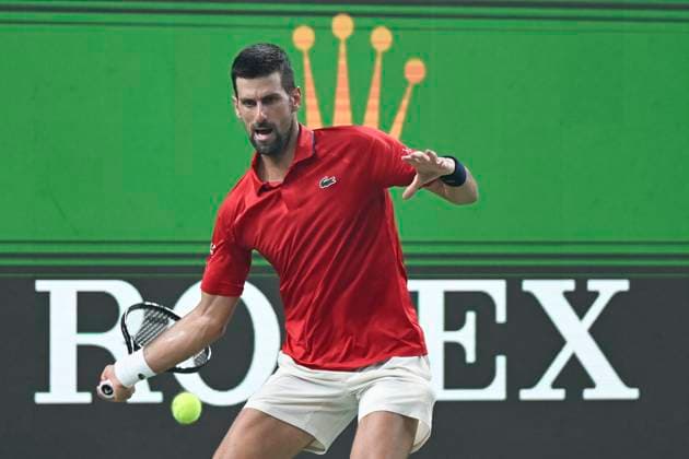 (251011) -- SHANGHAI, Oct. 11, 2025 -- Novak Djokovic hits a return during the men s singles semifinal between Novak Djokovic of Serbia and Valentin Vacherot of Monaco at the ATP, Tennis Herren World Tour Shanghai Masters tennis tournament in Shanghai, east China, Oct. 11, 2025. ) (SP)CHINA-SHANGHAI-TENNIS-ATP TOUR-SHANGHAI MASTERS-MEN S SINGLES (CN) ChenxHaoming 