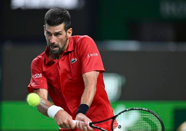 (251011) -- SHANGHAI, Oct. 11, 2025 -- Novak Djokovic hits a return during the men s singles semifinal between Novak Djokovic of Serbia and Valentin Vacherot of Monaco at the ATP, Tennis Herren World Tour Shanghai Masters tennis tournament in Shanghai, east China, Oct. 11, 2025. ) (SP)CHINA-SHANGHAI-TENNIS-ATP TOUR-SHANGHAI MASTERS-MEN S SINGLES (CN) ChenxHaoming 