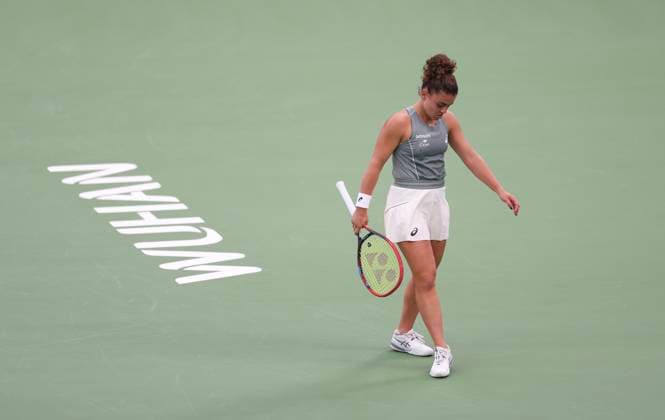 (251011) -- WUHAN, Oct. 11, 2025 -- Jasmine Paolini reacts during the women s singles semifinal between Jasmine Paolini of Italy and Coco Gauff of the United States at the 2025 Wuhan Open tennis tournament in Wuhan, central China s Hubei Province, Oct. 11, 2025. ) (SP)CHINA-WUHAN-TENNIS-WUHAN OPEN-WOMEN S SINGLES (CN) BaixXuefei 