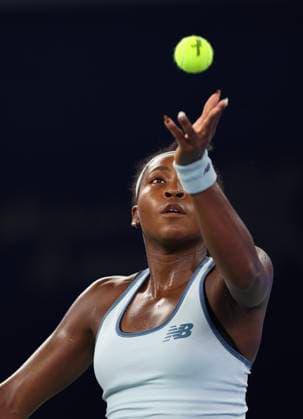 (251011) -- WUHAN, Oct. 11, 2025 -- Coco Gauff serves during the women s singles semifinal between Jasmine Paolini of Italy and Coco Gauff of the United States at the 2025 Wuhan Open tennis tournament in Wuhan, central China s Hubei Province, Oct. 11, 2025. ) (SP)CHINA-WUHAN-TENNIS-WUHAN OPEN-WOMEN S SINGLES (CN) BaixXuefei 