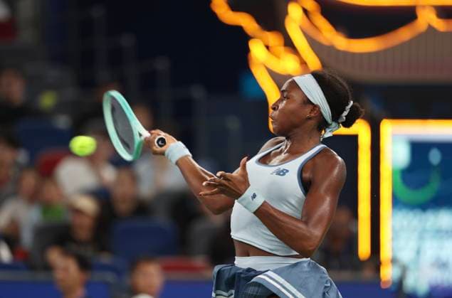 (251011) -- WUHAN, Oct. 11, 2025 -- Coco Gauff hits a return during the women s singles semifinal between Jasmine Paolini of Italy and Coco Gauff of the United States at the 2025 Wuhan Open tennis tournament in Wuhan, central China s Hubei Province, Oct. 11, 2025. ) (SP)CHINA-WUHAN-TENNIS-WUHAN OPEN-WOMEN S SINGLES (CN) BaixXuefei 