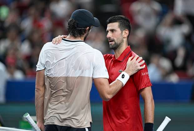 (251011) -- SHANGHAI, Oct. 11, 2025 -- Novak Djokovic (R) of Serbia and Valentin Vacherot of Monaco greet each other after the men s singles semifinal at the ATP, Tennis Herren World Tour Shanghai Masters tennis tournament in Shanghai, east China, Oct. 11, 2025. ) (SP)CHINA-SHANGHAI-TENNIS-ATP TOUR-SHANGHAI MASTERS-MEN S SINGLES (CN) ChenxHaoming 