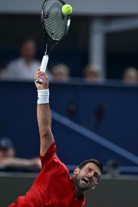 (251011) -- SHANGHAI, Oct. 11, 2025 -- Novak Djokovic serves during the men s singles semifinal between Novak Djokovic of Serbia and Valentin Vacherot of Monaco at the ATP, Tennis Herren World Tour Shanghai Masters tennis tournament in Shanghai, east China, Oct. 11, 2025. ) (SP)CHINA-SHANGHAI-TENNIS-ATP TOUR-SHANGHAI MASTERS-MEN S SINGLES (CN) ChenxHaoming 