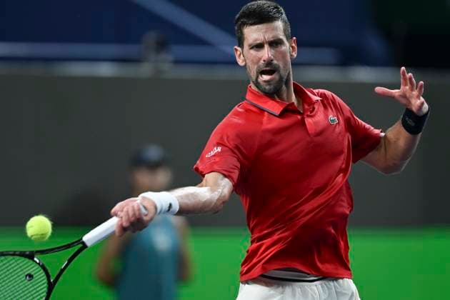 (251011) -- SHANGHAI, Oct. 11, 2025 -- Novak Djokovic hits a return during the men s singles semifinal between Novak Djokovic of Serbia and Valentin Vacherot of Monaco at the ATP, Tennis Herren World Tour Shanghai Masters tennis tournament in Shanghai, east China, Oct. 11, 2025. ) (SP)CHINA-SHANGHAI-TENNIS-ATP TOUR-SHANGHAI MASTERS-MEN S SINGLES (CN) ChenxHaoming 