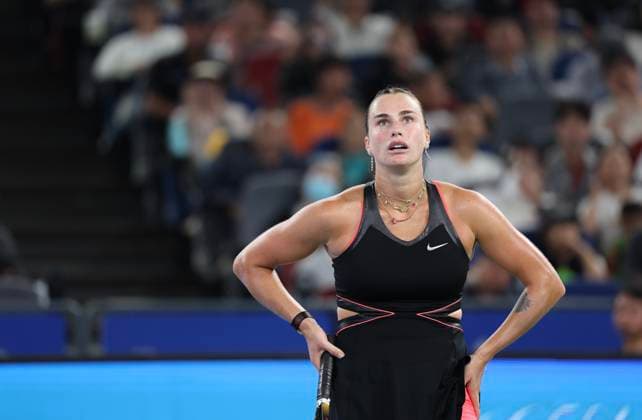 (251011) -- WUHAN, Oct. 11, 2025 -- Aryna Sabalenka reacts during the women s singles semifinal between Jessica Pegula of the United States and Aryna Sabalenka of Belarus at the 2025 Wuhan Open tennis tournament in Wuhan, central China s Hubei Province, Oct. 11, 2025. ) (SP)CHINA-WUHAN-TENNIS-WUHAN OPEN-WOMEN S SINGLES (CN) BaixXuefei 