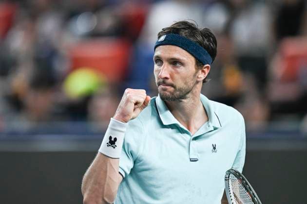 (251011) -- SHANGHAI, Oct. 11, 2025 -- Arthur Rinderknech celebrates scoring during the men s singles semifinal between Arthur Rinderknech of France and Daniil Medvedev of Russia at the ATP, Tennis Herren World Tour Shanghai Masters tennis tournament in Shanghai, east China, Oct. 11, 2025. ) (SP)CHINA-SHANGHAI-TENNIS-ATP TOUR-SHANGHAI MASTERS-MEN S SINGLES (CN) ChenxHaoming 