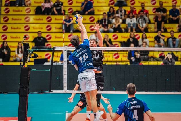 Volleyball mens season 2025 2026 League Cup 2025 VfB Friedrichshafen vs SVG Lüneburg 11 10 2025 Simon Kohn 16 VfB Friedrichshafen in the block against Santeri Välimaa 12 SVG Lüneburg
