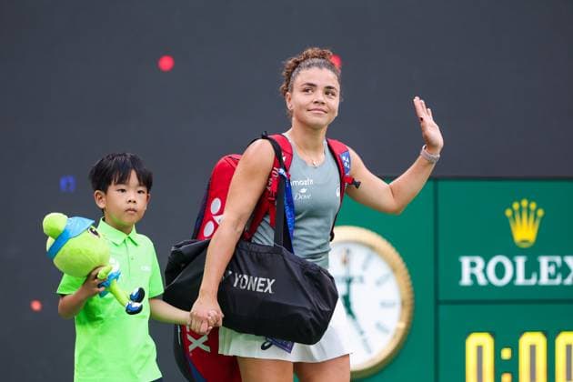 WUHAN, CHINA - OCTOBER 11: Jasmine Paolini of Italy walks towards the court prior to the Women s Singles Semifinal match against Coco Gauff of the United States on day 8 of 2025 Wuhan Open at Optics Valley International Tennis Center on October 11, 2025 in Wuhan, Hubei Province of China.  Copyright: xVCGx 111596586740