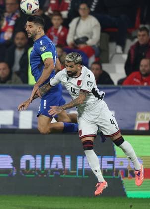 Serbia vs Albania, Group K World Cup 2026 European Qualifiers Leskovac, Serbia. 11th Oct, 2025. Serbia s Aleksandar Mitrovic (L) vies with Albania s Elseid Hysaj (R) during the Group K World Cup 2026 European Qualifiers football match between Serbia and Albania on October 11. 2025. in Leskovac, Serbia. Leskovac Serbia Copyright: xPedjaxMilosavljevic STARSPORTx