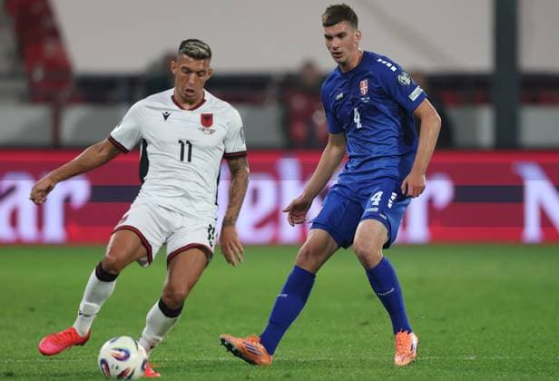 Serbia vs Albania, Group K World Cup 2026 European Qualifiers Leskovac, Serbia. 11th Oct, 2025. Serbia s Veljko Milosavljevic (R) vies with Albania s Myrto Uzuni (L) during the Group K World Cup 2026 European Qualifiers football match between Serbia and Albania on October 11. 2025. in Leskovac, Serbia. Leskovac Serbia Copyright: xPedjaxMilosavljevic STARSPORTx