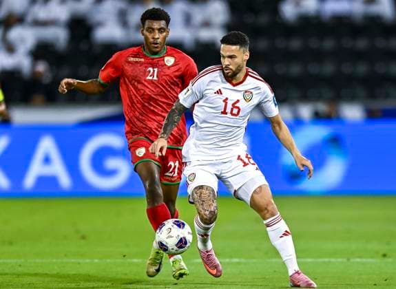 UNITED ARAB EMIRATES v OMAN-2026 FIFA World Cup, WM, Weltmeisterschaft, Fussball ASIAN QUALIFIER PLAYOFFS Marcus Vinicius of United Arab Emirates and Abdul Rahman Al Mushaifri of Oman in action during the FIFA World Cup 2026 AFC Asian qualifiers playoffs group A match between United Arab Emirates and Oman at Jassim Bin Hamad Stadium in Doha, Qatar, on October 11, 2025. DOHA Qatar Copyright: xNOUSHADx