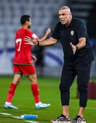 UNITED ARAB EMIRATES v OMAN-2026 FIFA World Cup, WM, Weltmeisterschaft, Fussball ASIAN QUALIFIER PLAYOFFS Head coach of United Arab Emirates Cosmin Olaroiu reacts during the FIFA World Cup 2026 AFC Asian qualifiers playoffs group A match between United Arab Emirates and Oman at Jassim Bin Hamad Stadium in Doha, Qatar, on October 11, 2025. DOHA Qatar Copyright: xNOUSHADx