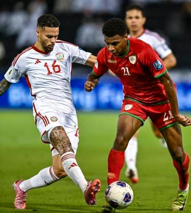 UNITED ARAB EMIRATES v OMAN-2026 FIFA World Cup, WM, Weltmeisterschaft, Fussball ASIAN QUALIFIER PLAYOFFS Marcus Vinicius (L) of United Arab Emirates and Abdul Rahman Al Mushaifri of Oman in action during the FIFA World Cup 2026 AFC Asian qualifiers playoffs group A match between United Arab Emirates and Oman at Jassim Bin Hamad Stadium in Doha, Qatar, on October 11, 2025. DOHA Qatar Copyright: xNOUSHADx