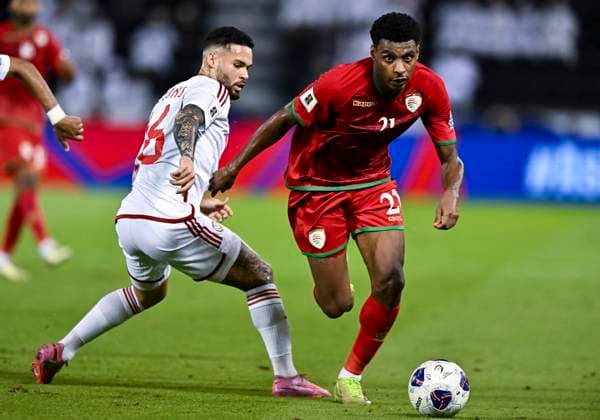 UNITED ARAB EMIRATES v OMAN-2026 FIFA World Cup, WM, Weltmeisterschaft, Fussball ASIAN QUALIFIER PLAYOFFS Marcus Vinicius (L) of United Arab Emirates and Abdul Rahman Al Mushaifri of Oman in action during the FIFA World Cup 2026 AFC Asian qualifiers playoffs group A match between United Arab Emirates and Oman at Jassim Bin Hamad Stadium in Doha, Qatar, on October 11, 2025. DOHA Qatar Copyright: xNOUSHADx