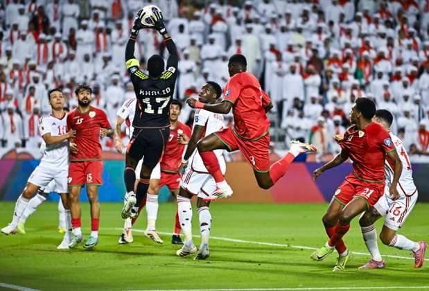 UNITED ARAB EMIRATES v OMAN-2026 FIFA World Cup, WM, Weltmeisterschaft, Fussball ASIAN QUALIFIER PLAYOFFS Khalid Eisa ( 17) of United Arab Emirates and Thani Gharib Al Rushaidi of Oman in action during the FIFA World Cup 2026 AFC Asian qualifiers playoffs group A match between United Arab Emirates and Oman at Jassim Bin Hamad Stadium in Doha, Qatar, on October 11, 2025. DOHA Qatar Copyright: xNOUSHADx