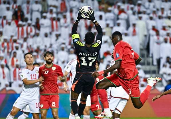 UNITED ARAB EMIRATES v OMAN-2026 FIFA World Cup, WM, Weltmeisterschaft, Fussball ASIAN QUALIFIER PLAYOFFS Khalid Eisa ( 17) of United Arab Emirates and Thani Gharib Al Rushaidi of Oman in action during the FIFA World Cup 2026 AFC Asian qualifiers playoffs group A match between United Arab Emirates and Oman at Jassim Bin Hamad Stadium in Doha, Qatar, on October 11, 2025. DOHA Qatar Copyright: xNOUSHADx