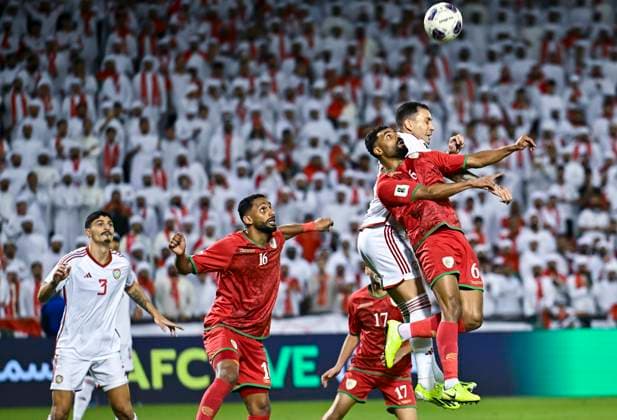 UNITED ARAB EMIRATES v OMAN-2026 FIFA World Cup, WM, Weltmeisterschaft, Fussball ASIAN QUALIFIER PLAYOFFS Caio Canedo Correa (2ndR) of United Arab Emirates and Nayef Faraj Bait Sabih of Oman in action during the FIFA World Cup 2026 AFC Asian qualifiers playoffs group A match between United Arab Emirates and Oman at Jassim Bin Hamad Stadium in Doha, Qatar, on October 11, 2025. DOHA Qatar Copyright: xNOUSHADx