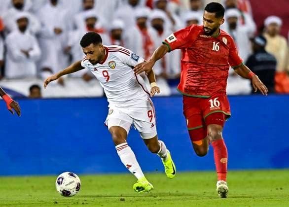 UNITED ARAB EMIRATES v OMAN-2026 FIFA World Cup, WM, Weltmeisterschaft, Fussball ASIAN QUALIFIER PLAYOFFS Harib Abdalla Almusharrkh (L) of United Arab Emirates and Khalid Nasser Al Braiki of Oman in action during the FIFA World Cup 2026 AFC Asian qualifiers playoffs group A match between United Arab Emirates and Oman at Jassim Bin Hamad Stadium in Doha, Qatar, on October 11, 2025. DOHA Qatar Copyright: xNOUSHADx