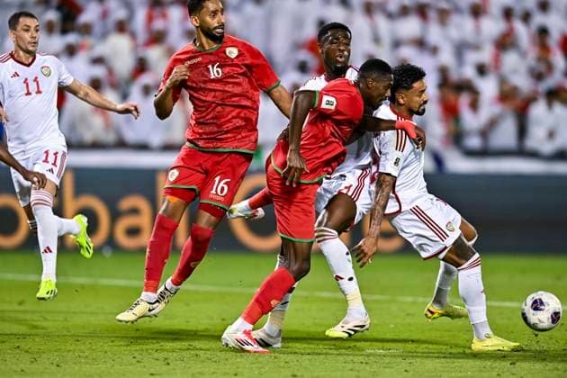 UNITED ARAB EMIRATES v OMAN-2026 FIFA World Cup, WM, Weltmeisterschaft, Fussball ASIAN QUALIFIER PLAYOFFS Caio Fernandes (R) of United Arab Emirates and Thani Gharib Al Rushaidi of Oman in action during the FIFA World Cup 2026 AFC Asian qualifiers playoffs group A match between United Arab Emirates and Oman at Jassim Bin Hamad Stadium in Doha, Qatar, on October 11, 2025. DOHA Qatar Copyright: xNOUSHADx