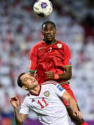 UNITED ARAB EMIRATES v OMAN-2026 FIFA World Cup, WM, Weltmeisterschaft, Fussball ASIAN QUALIFIER PLAYOFFS Caio Canedo Correa (bottom) of United Arab Emirates and Thani Gharib Al Rushaidi of Oman in action during the FIFA World Cup 2026 AFC Asian qualifiers playoffs group A match between United Arab Emirates and Oman at Jassim Bin Hamad Stadium in Doha, Qatar, on October 11, 2025. DOHA Qatar Copyright: xNOUSHADx