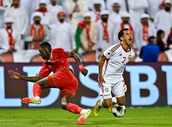 UNITED ARAB EMIRATES v OMAN-2026 FIFA World Cup, WM, Weltmeisterschaft, Fussball ASIAN QUALIFIER PLAYOFFS Ali Saleh Amro (R) of United Arab Emirates and Thani Gharib Al Rushaidi of Oman in action during the FIFA World Cup 2026 AFC Asian qualifiers playoffs group A match between United Arab Emirates and Oman at Jassim Bin Hamad Stadium in Doha, Qatar, on October 11, 2025. DOHA Qatar Copyright: xNOUSHADx