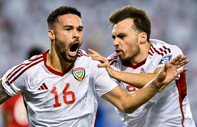 UNITED ARAB EMIRATES v OMAN-2026 FIFA World Cup, WM, Weltmeisterschaft, Fussball ASIAN QUALIFIER PLAYOFFS Marcus Vinicius (L) of United Arab Emirates celebrates after scoring a goal during the FIFA World Cup 2026 AFC Asian qualifiers playoffs group A match between United Arab Emirates and Oman at Jassim Bin Hamad Stadium in Doha, Qatar, on October 11, 2025. DOHA Qatar Copyright: xNOUSHADx