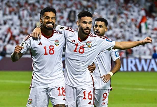 UNITED ARAB EMIRATES v OMAN-2026 FIFA World Cup, WM, Weltmeisterschaft, Fussball ASIAN QUALIFIER PLAYOFFS Caio Fernandes (L) of United Arab Emirates celebrating with teammate after scoring the goal during the FIFA World Cup 2026 AFC Asian qualifiers playoffs group A match between United Arab Emirates and Oman at Jassim Bin Hamad Stadium in Doha, Qatar, on October 11, 2025. DOHA Qatar Copyright: xNOUSHADx
