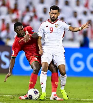 UNITED ARAB EMIRATES v OMAN-2026 FIFA World Cup, WM, Weltmeisterschaft, Fussball ASIAN QUALIFIER PLAYOFFS Harib Abdalla Almusharrkh of United Arab Emirates and Thani Gharib Al Rushaidi of Oman in action during the FIFA World Cup 2026 AFC Asian qualifiers playoffs group A match between United Arab Emirates and Oman at Jassim Bin Hamad Stadium in Doha, Qatar, on October 11, 2025. DOHA Qatar Copyright: xNOUSHADx