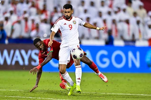 UNITED ARAB EMIRATES v OMAN-2026 FIFA World Cup, WM, Weltmeisterschaft, Fussball ASIAN QUALIFIER PLAYOFFS Harib Abdalla Almusharrkh of United Arab Emirates and Thani Gharib Al Rushaidi of Oman in action during the FIFA World Cup 2026 AFC Asian qualifiers playoffs group A match between United Arab Emirates and Oman at Jassim Bin Hamad Stadium in Doha, Qatar, on October 11, 2025. DOHA Qatar Copyright: xNOUSHADx