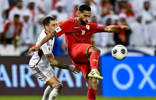 UNITED ARAB EMIRATES v OMAN-2026 FIFA World Cup, WM, Weltmeisterschaft, Fussball ASIAN QUALIFIER PLAYOFFS Caio Canedo Correa (L) of United Arab Emirates and Khalid Nasser Al Braiki of Oman in action during the FIFA World Cup 2026 AFC Asian qualifiers playoffs group A match between United Arab Emirates and Oman at Jassim Bin Hamad Stadium in Doha, Qatar, on October 11, 2025. DOHA Qatar Copyright: xNOUSHADx