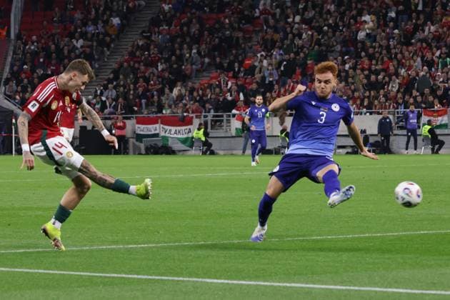 (251012) -- BUDAPEST, Oct. 12, 2025 -- Bendeguz Bolla (L) of Hungary shoots the ball during the 2026 FIFA World Cup, WM, Weltmeisterschaft, Fussball European Qualifiers football match between Hungary and Armenia in Budapest, Hungary, on Oct. 11, 2025. (Photo by Xinhua) (SP)HUNGARY-BUDAPEST-FOOTBALL-FIFA WORLD CUP QUALIFIERS-HUNGARY VS ARMENIA AttilaxVolgyi 