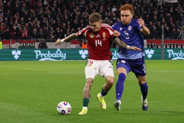 (251012) -- BUDAPEST, Oct. 12, 2025 -- Bendeguz Bolla (L) of Hungary vies with Erik Piloyan of Armenia during the 2026 FIFA World Cup, WM, Weltmeisterschaft, Fussball European Qualifiers football match between Hungary and Armenia in Budapest, Hungary, on Oct. 11, 2025. (Photo by Xinhua) (SP)HUNGARY-BUDAPEST-FOOTBALL-FIFA WORLD CUP QUALIFIERS-HUNGARY VS ARMENIA AttilaxVolgyi 