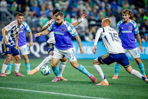 October 11, 2025, Seattle, Washington, USA: Seattle Sounders FC forward Jordan Morris (13) and Real Salt Lake defender Justen Glad (15) during the match between Real Salt Lake and the Seattle Sounders FC in the 2025 Major League Soccer match at Lumen Field, Seattle, Washington Seattle USA - ZUMAj111 20251011_zsp_j111_008 Copyright: xTomxJonesx