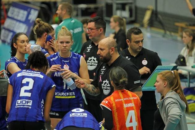 Womens Volleyball Bundesliga Konstantin Bitter, coach of Allianz MTV Stuttgart, gives instructions to his players during a break