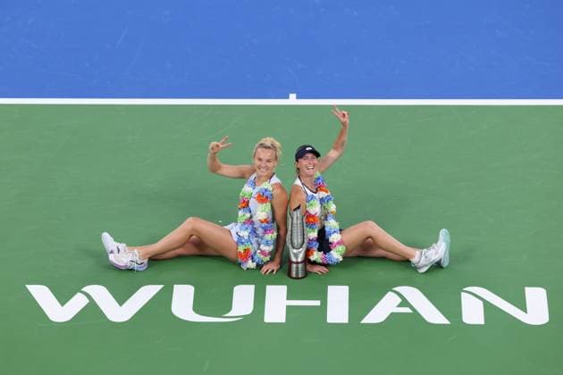 WUHAN, CHINA - OCTOBER 12: Storm Hunter of Australia and Katerina Siniakova of the Czech Republic celebrate with the trophy at the award ceremony after winning the Women s Doubles Final match against Anna Danilina of Kazakhstan and Aleksandra Krunic of Serbia on day 9 of 2025 Wuhan Open at Optics Valley International Tennis Center on October 12, 2025 in Wuhan, Hubei Province of China.  Copyright: xVCGx 111596715232
