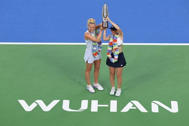WUHAN, CHINA - OCTOBER 12: Storm Hunter of Australia and Katerina Siniakova of the Czech Republic celebrate with the trophy at the award ceremony after winning the Women s Doubles Final match against Anna Danilina of Kazakhstan and Aleksandra Krunic of Serbia on day 9 of 2025 Wuhan Open at Optics Valley International Tennis Center on October 12, 2025 in Wuhan, Hubei Province of China.  Copyright: xVCGx 111596715230
