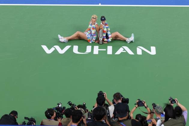 WUHAN, CHINA - OCTOBER 12: Storm Hunter of Australia and Katerina Siniakova of the Czech Republic celebrate with the trophy at the award ceremony after winning the Women s Doubles Final match against Anna Danilina of Kazakhstan and Aleksandra Krunic of Serbia on day 9 of 2025 Wuhan Open at Optics Valley International Tennis Center on October 12, 2025 in Wuhan, Hubei Province of China.  Copyright: xVCGx 111596715231