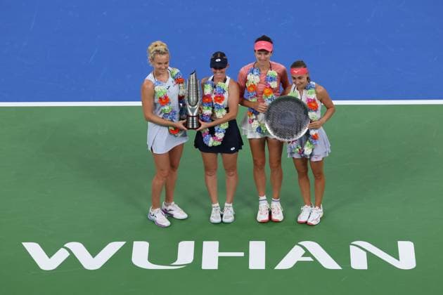 WUHAN, CHINA - OCTOBER 12: Champions Storm Hunter of Australia and Katerina Siniakova of the Czech Republic and runners-up Anna Danilina of Kazakhstan and Aleksandra Krunic of Serbia pose with the trophies at the award ceremony following the Women s Doubles Final match on day 9 of 2025 Wuhan Open at Optics Valley International Tennis Center on October 12, 2025 in Wuhan, Hubei Province of China.  Copyright: xVCGx 111596715225